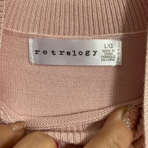 pink and grey stripped sweater from retrology with gold buttons on the shoulders - Picture 4 of 5